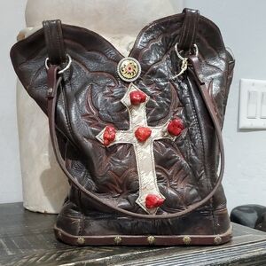 Elegant Brown Leather Tote with Cross Embellishment